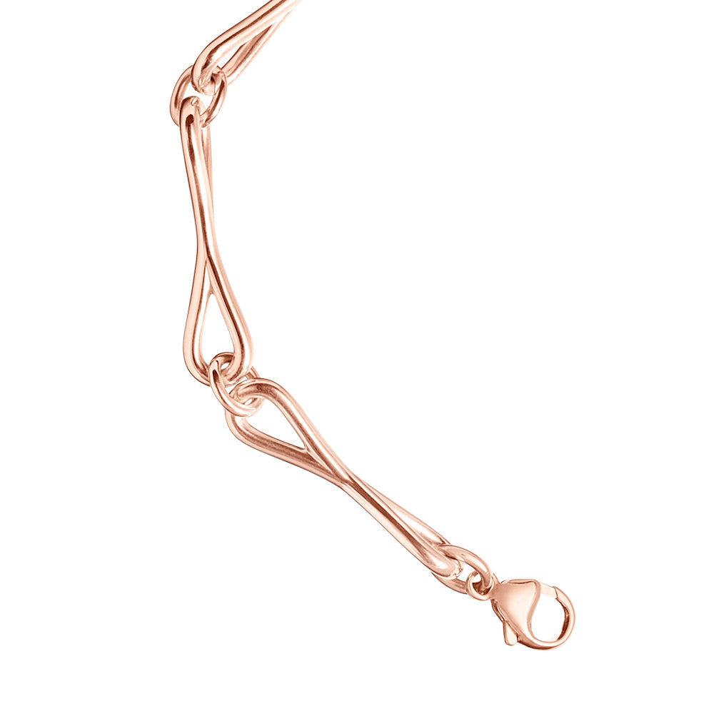 Close detail of Roseate WaterDrop medium link bracelet in 14k rose gold with mother-of-pearl