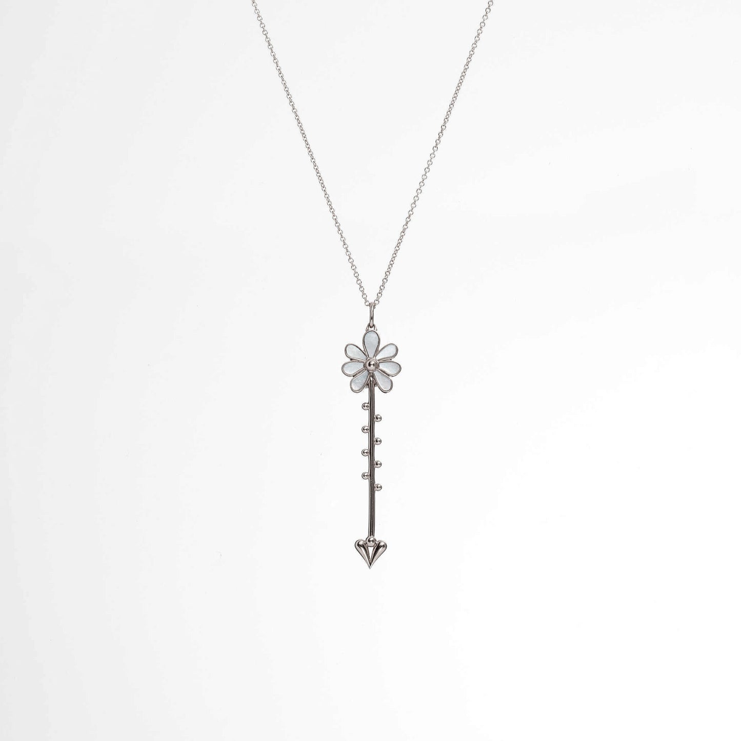 Bloom Wand Pendant in sterling silver with luminous mother-of-pearl on a chain worn on model