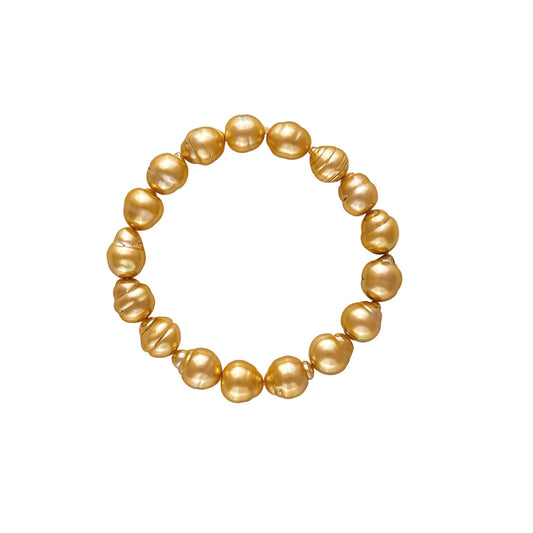 Jewelmer Golden South Sea cultured pearl stretch bracelet featuring naturally golden baroque pearls with exceptional luster.