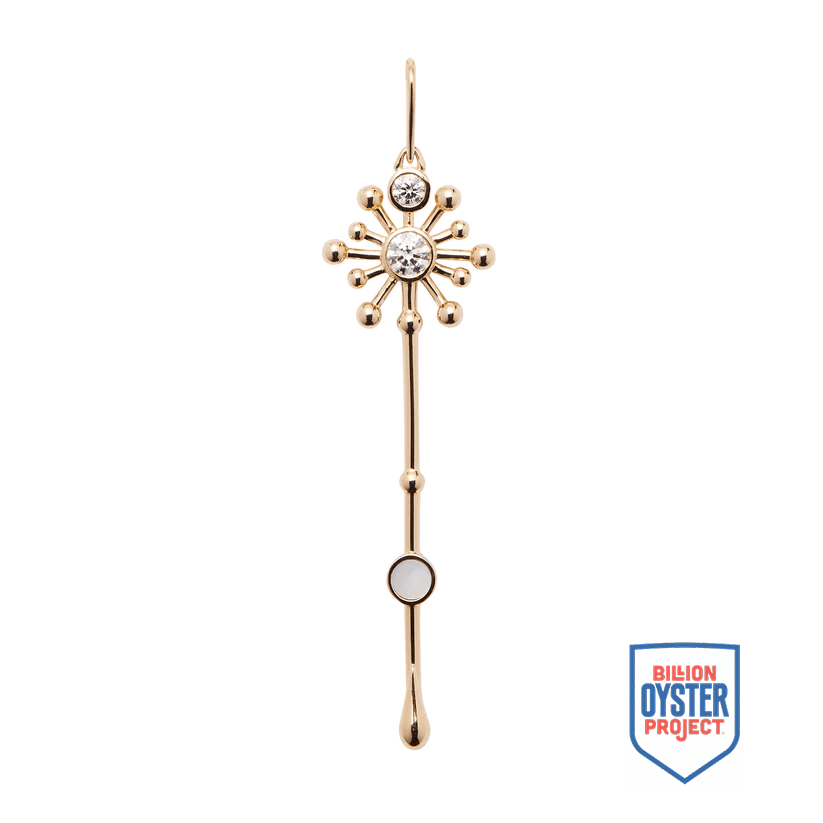 Light Wand Pendant in 18K yellow gold with luminous mother-of-pearl, shown with Billion Oyster Project badge supporting oyster reef restoration