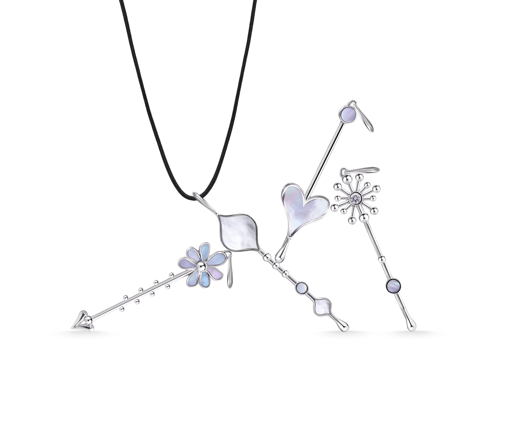 Multiple Wand pendants in sterling silver with mother-of-pearl displayed together