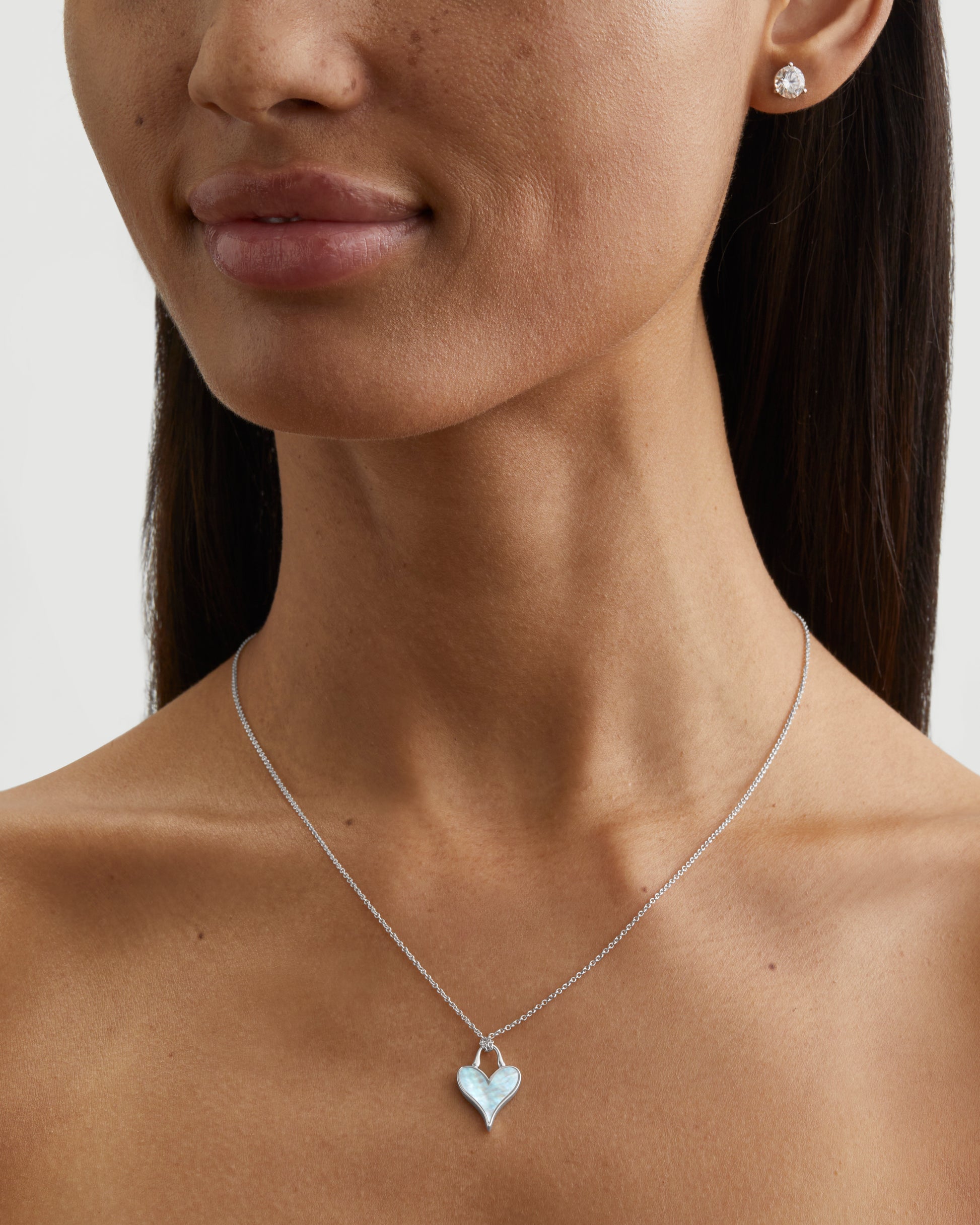 Roseate LoveLock 12mm pendant in sterling silver with mother-of-pearl worn on a model