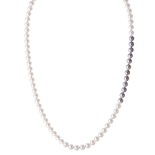 The Odyssey | Roseate Moons 6mm white and blue round Akoya pearl necklace with a 18k white gold swirl clasp.