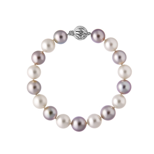 The Odyssey | Roseate Moons 10-11mm alternating Tahitian and Akoya pearl bracelet with 18k white gold swirl clasp.