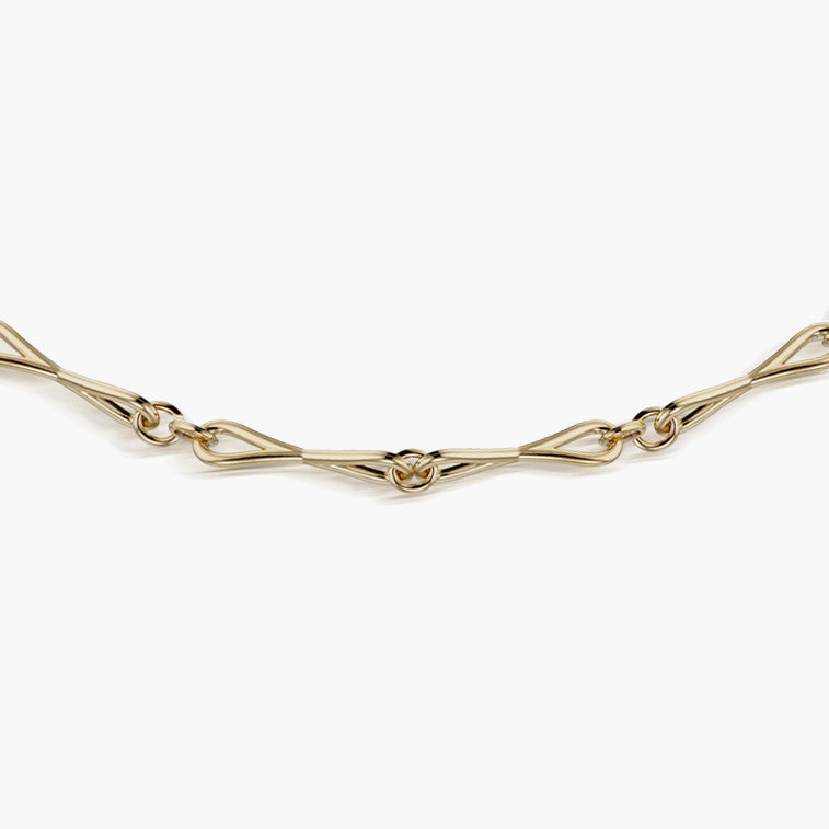Close detail of Roseate WaterDrop medium link necklace in 14k yellow gold with mother-of-pearl