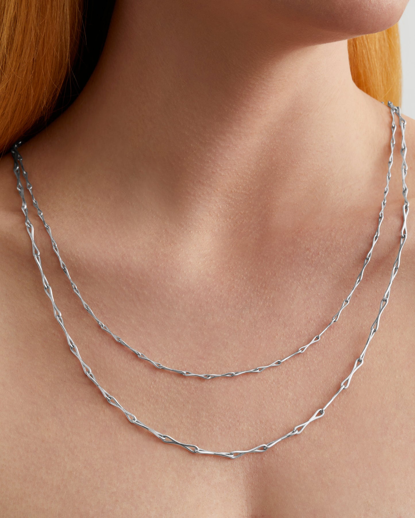 Roseate WaterDrop small link necklace in sterling silver with mother-of-pearl worn on a model