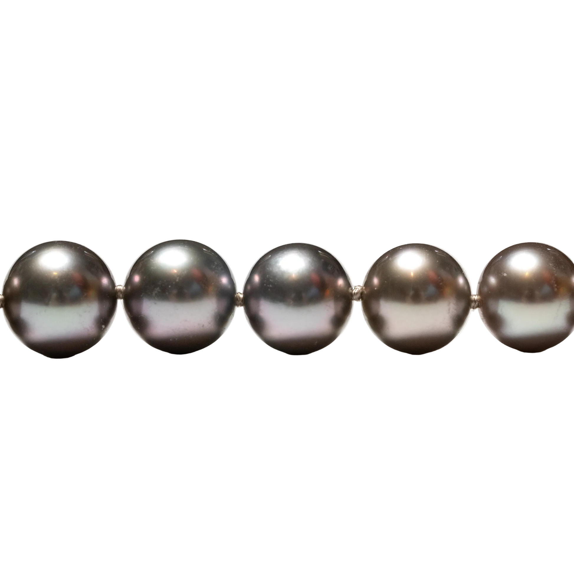 Close-up image of Tahitian round pearls