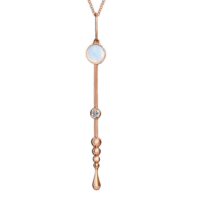 Cropped view of Loyalty Wand Pendant in 18K rose gold with luminous mother-of-pearl and diamond on a chain