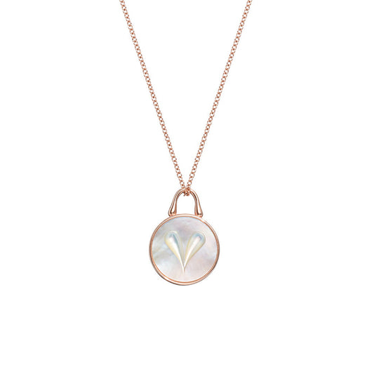 Close detail of Roseate Cameo 12mm heart pendant in 18k rose gold with mother-of-pearl