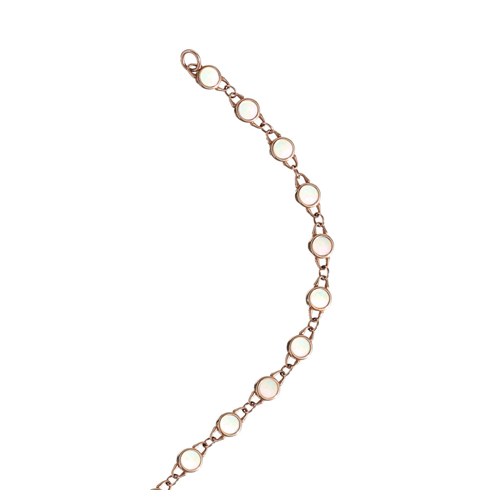 Close detail of Roseate TreasureLock 3mm mother-of-pearl disc bracelet in 18k rose gold